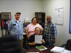 (4 out of 5 members present) Seated: Ismael Borunda (La Mesa) Left to right: Gabriel Gutierrez (Berino), Rosaura Parga (Desert Sands), Roosevelt Boyer (Vado)